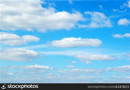 Blue sky background with a tiny clouds