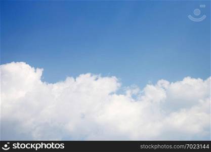 Blue sky background with cloud. Copy space