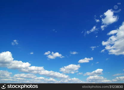 blue sky background with tiny clouds