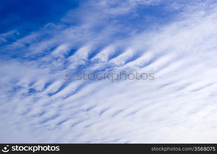 Blue Sky background with tiny clouds