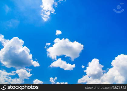 blue sky background with tiny clouds