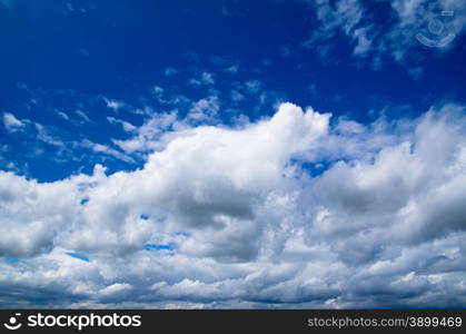 blue sky background with tiny clouds