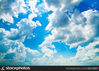 blue sky background with tiny clouds