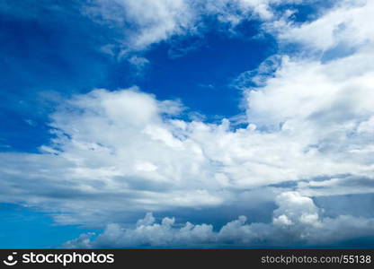 blue sky background with tiny clouds