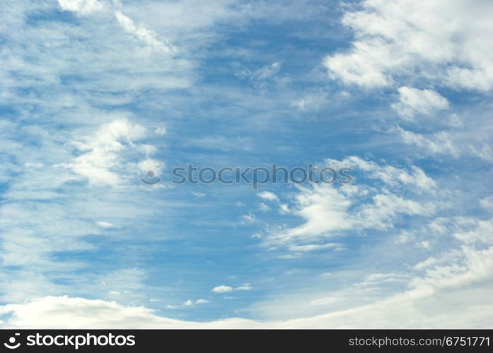 Blue Sky background with tiny clouds