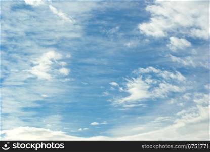 Blue Sky background with tiny clouds