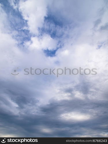 blue sky background with tiny clouds