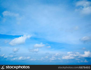 blue sky background with tiny clouds