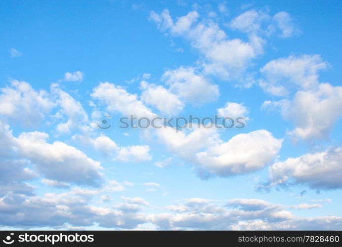 blue sky background with tiny clouds