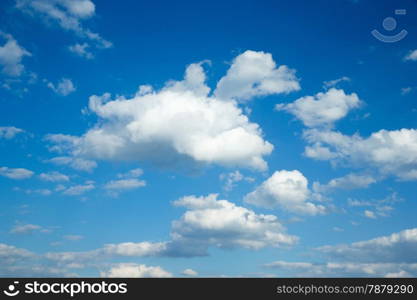 Blue sky background with tiny clouds