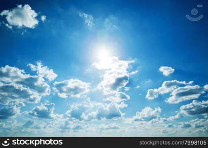 blue sky background with tiny clouds