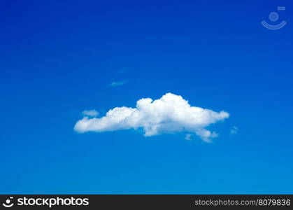 Blue sky background with tiny clouds