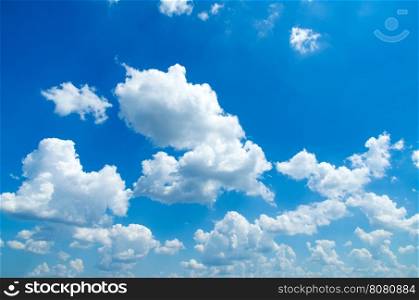 Blue sky background with tiny clouds