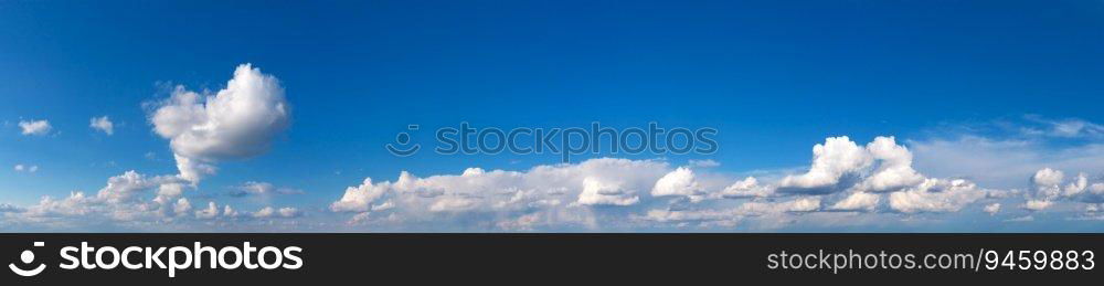 Blue Sky background with tiny Clouds. Panorama background