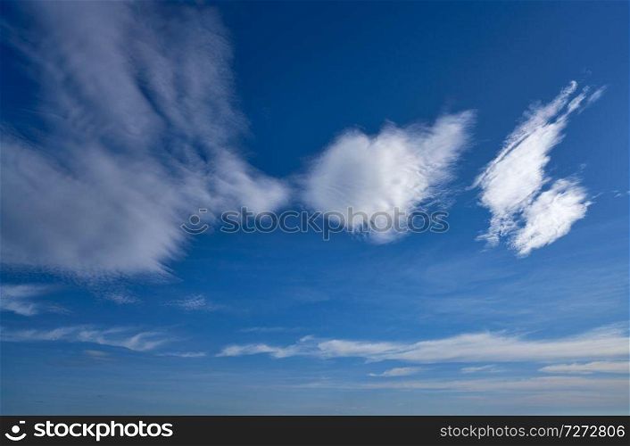 Blue sky in summer with white clouds background