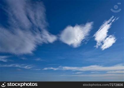 Blue sky in summer with white clouds background