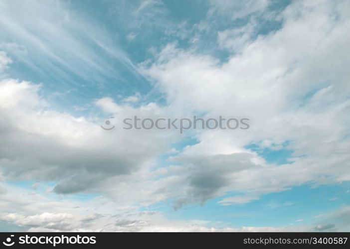 blue sky is covered by white clouds