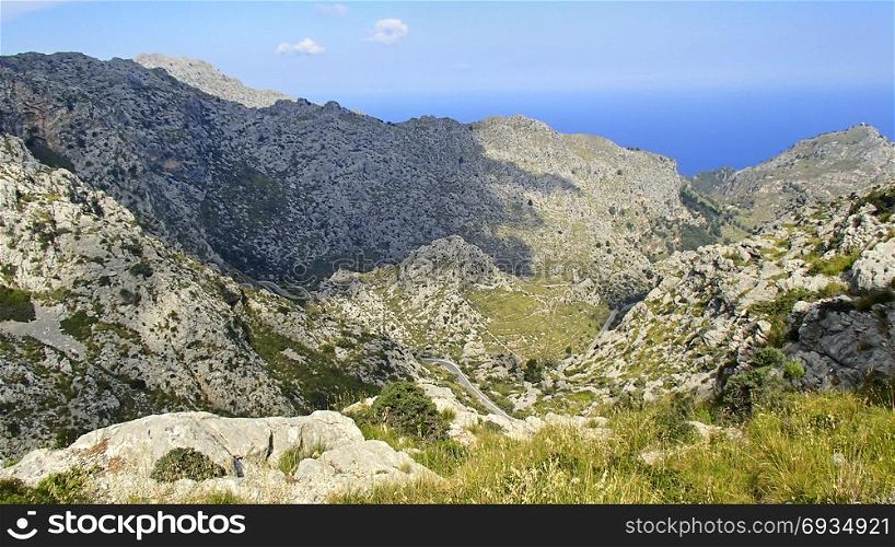 Blue sky over the Tramuntana Mountains on the Spanish Mediterranean island of Majorca, with beautiful hiking trails and lookout points