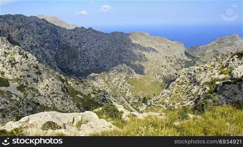 Blue sky over the Tramuntana Mountains on the Spanish Mediterranean island of Majorca, with beautiful hiking trails and lookout points