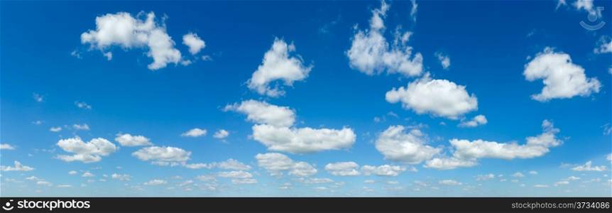 Blue sky panorama with white cumulus clouds (nature background).