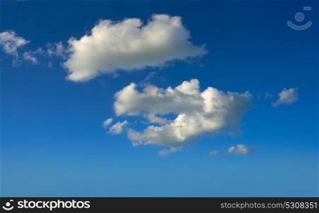 Blue sky summer white cumulus clouds background