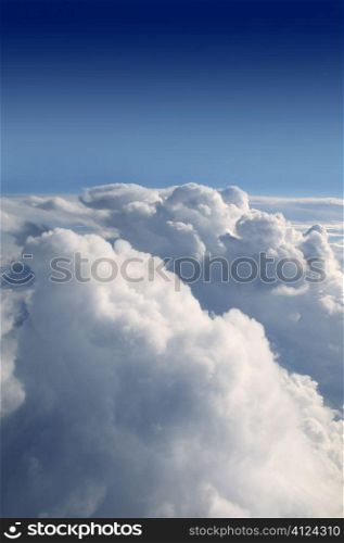 Blue sky view from aircraft airplane and white clouds, texture