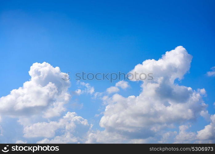 Blue sky white cumulus clouds background