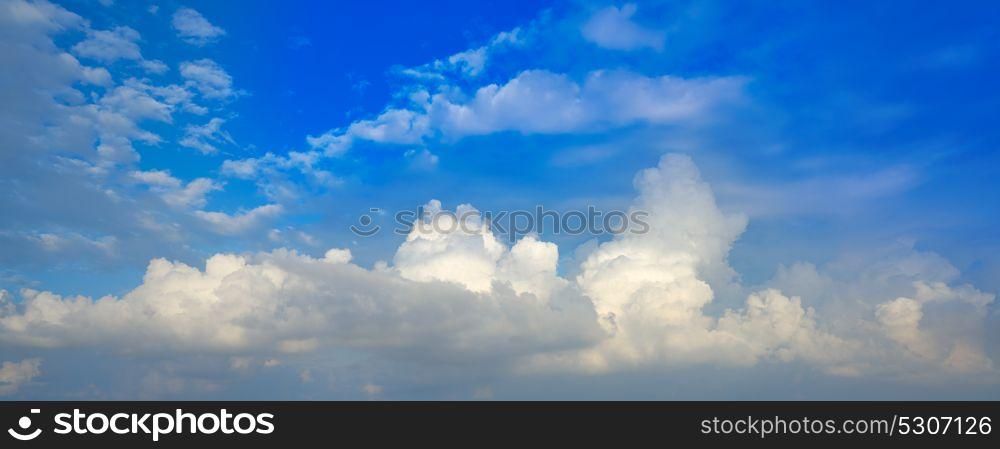Blue sky white cumulus clouds background
