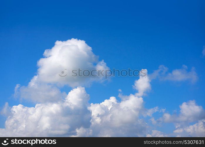 Blue sky white cumulus clouds background