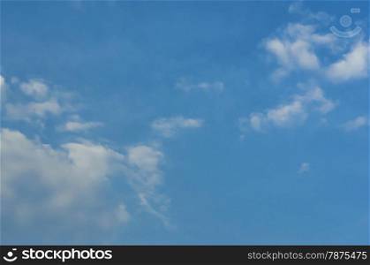 blue sky. white fluffy clouds in the blue sky background