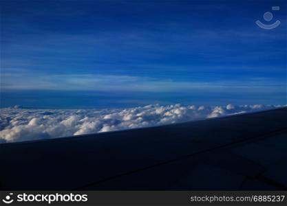 blue sky with cloud view from airplane window