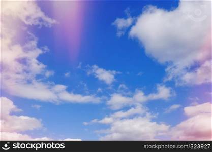 Blue sky with clouds and red flare abstract nature background. Blue sky with clouds abstract nature background