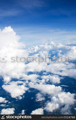 blue sky with clouds and sun