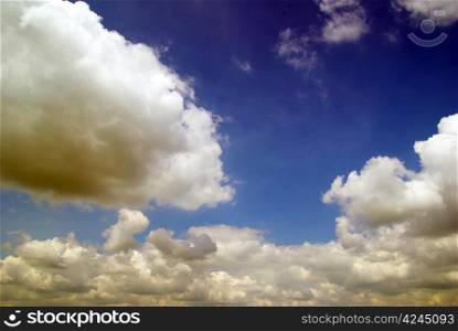 blue sky with clouds and sun
