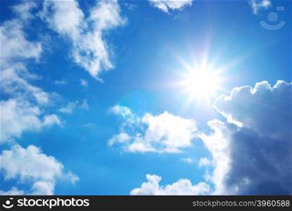 Blue sky with clouds and sun. Nature composition.