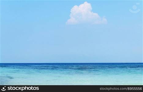 Blue sky with clouds and tropical sea