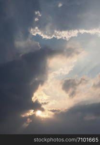 blue sky with clouds at sunset useful as a background. blue sky with clouds background