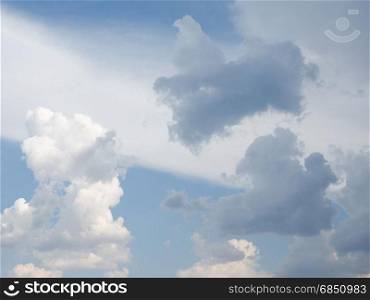 blue sky with clouds background. blue sky with clouds useful as a background