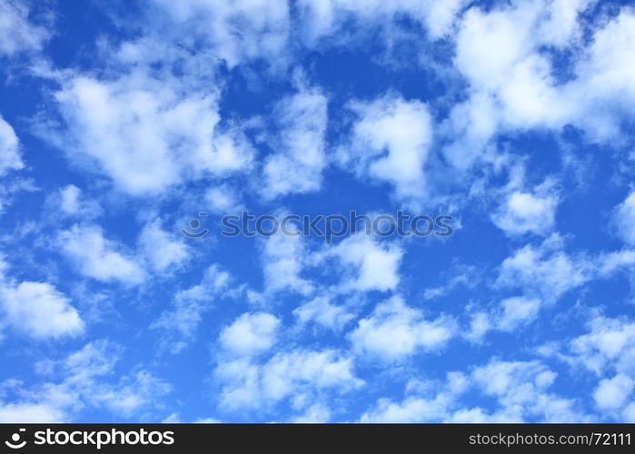 Blue sky with clouds, may be used as background