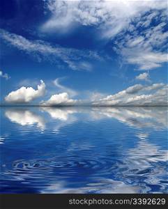 blue sky with clouds over sea background