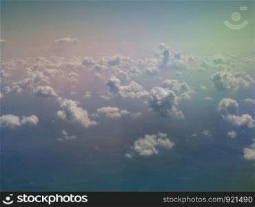 blue sky with clouds seen from plane useful as a background. blue sky with clouds background seen from flying plane