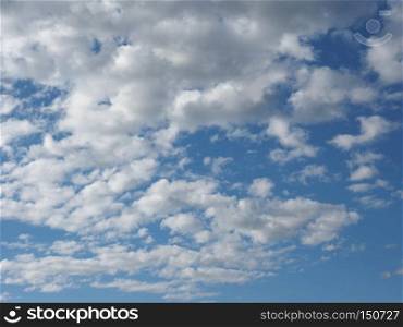 blue sky with clouds useful as a background. blue sky with clouds background