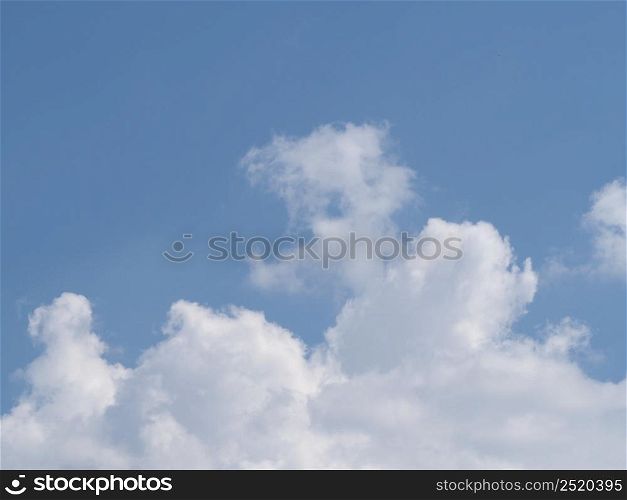 blue sky with clouds useful as a background. blue sky with clouds background