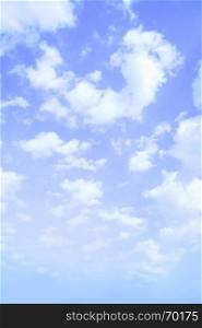 Blue sky with clouds - vertical background