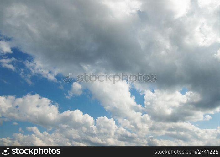 blue sky with fleecy clouds