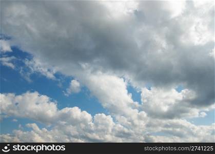 blue sky with fleecy clouds