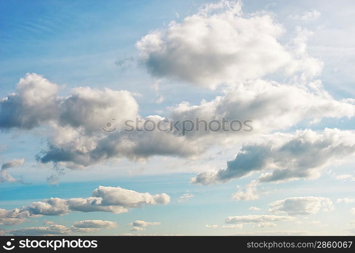 Blue sky with fluffy clouds