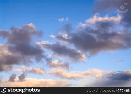 Blue sky with hazy clouds background