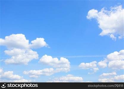 Blue sky with light cumulus clouds - may be used as background
