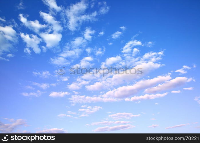 Blue sky with light cumulus clouds, may be used as background